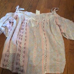 Cold shoulder shirt with tassel